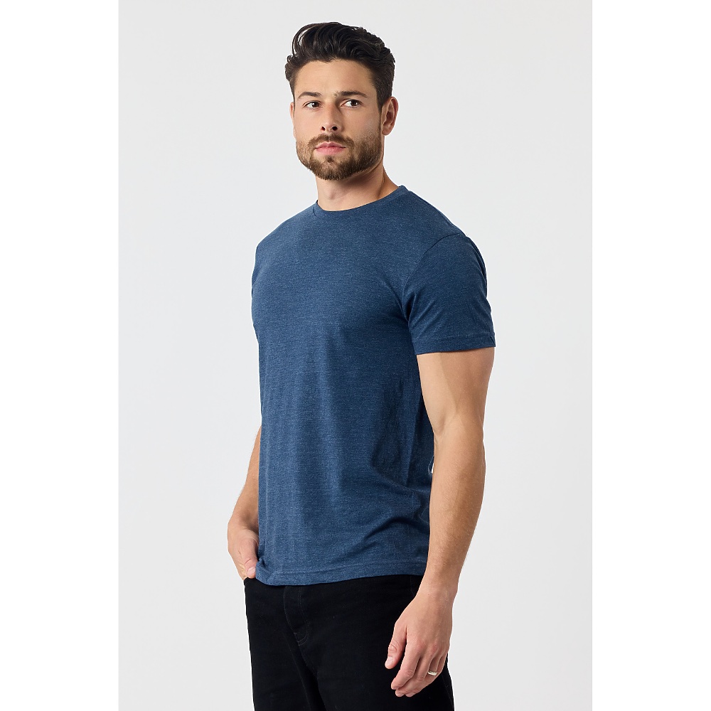 A man in the 501 adult everyday tee in heathered navy, three-quarter view